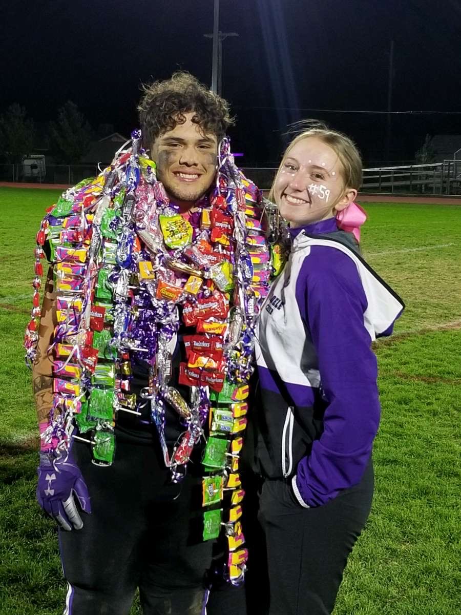 Adrien and Kaylee at his football celebration